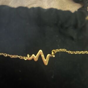 Elegant Gold Heartbeat Necklace